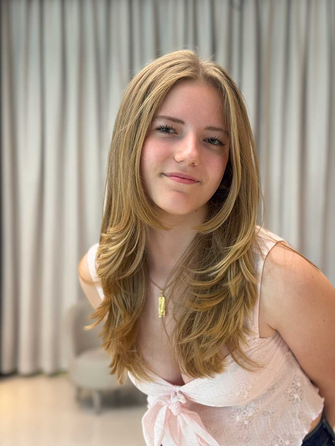 Fresh even colour after root touch-up and toning at Ivy Dubai