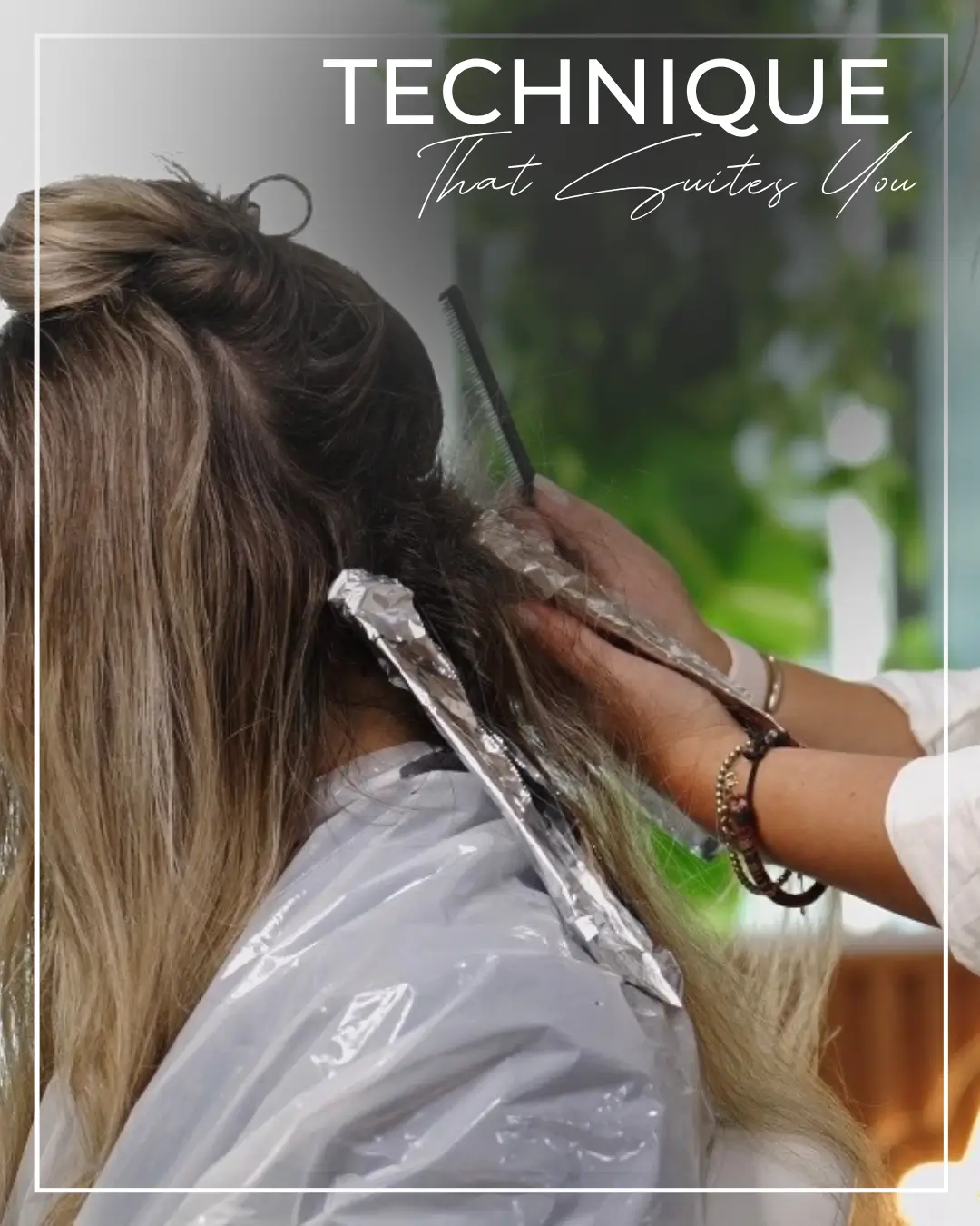 IVY Dubai stylist applying hair color with foils to a salon client.